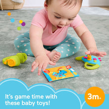 Baby activity play mat with colorful book and green rattle toy pieces
