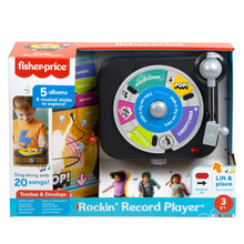 Fisher-Price record player toy in box with turntable and 5 colorful records