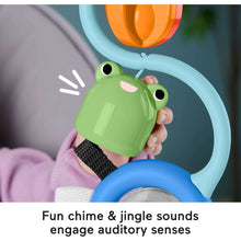 Sensory high chair toy with green frog roller on blue arch and jingling ball