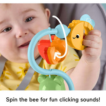 Sensory high chair toy with orange spinner and yellow bee on blue arch