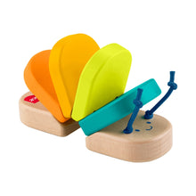 Wooden caterpillar clacker rattle with colorful hinged pieces and blue pegs
