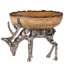 Wood centerpiece bowl on hammered-metal reindeer pedestal with three visible legs