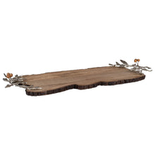 Wood serving board with metal leaf and berry accents along side corners