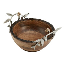 Wooden serving bowl with dark rim and silver leaf accents
