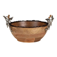 Wooden serving bowl with dark rim and sculpted silver leaf handle details