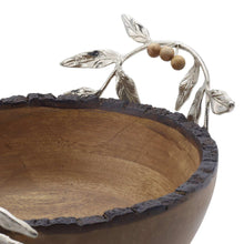 Wooden serving bowl rim with dark edge and silver leaf-acorn decor