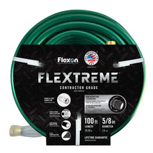 Green contractor-grade garden hose coil with brass female-thread fitting