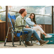 Blue foldable rocking camp chair with gray mesh seat, cup holder, and side pouch