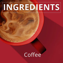 Foamy coffee in a red mug, crema swirl filling the cup.