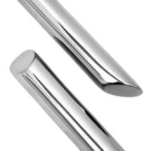 Stainless steel flatware pieces with mirrored finish close-up