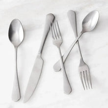 Antiqued flatware set: spoon, fork, and knife with satin silver finish
