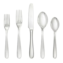 Stainless steel place setting utensils: forks, spoon, and butter knife