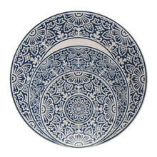 Blue decorative dinner plate with intricate floral border and central medallion