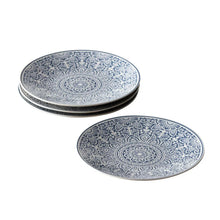 Blue decorative dinner plates with detailed floral medallion pattern across the rim