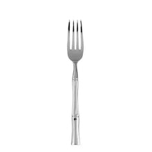 Stainless dinner fork with four tines and bamboo-style handle
