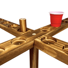 Wood tabletop hook-and-ring toss center with red cup and beam openings