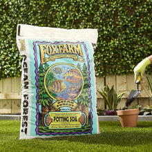 FoxFarm potting soil bag on grass outdoors