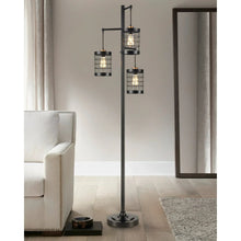 Black metal Franklin floor lamp with three caged glass light shades on stand