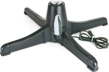 Dark green rotating artificial Christmas tree stand base with four arms and central hub