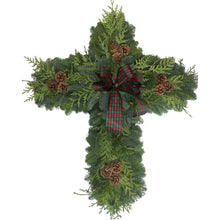 Decorative pine cross wreath with plaid bow and pinecone accents