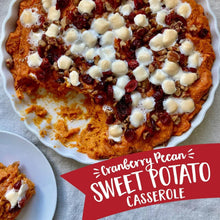 Sweet potato casserole topped with cranberry and pecans.