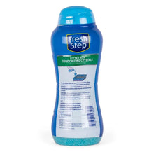 Fresh Step litter box deodorizing crystals bottle, blue with white label