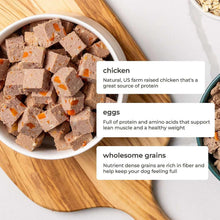 Chicken dog food roll pieces in a bowl with visible orange bits