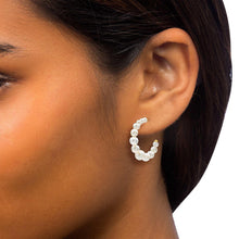 Freshwater pearl hoop earrings with graduated pearls and 14kt yellow gold post