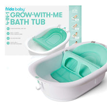 White baby bathtub with teal sling insert for newborn seating