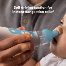 Electric nasal aspirator in use with clear chamber and blue nozzle near child