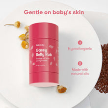 Red Gassy Belly Rub bottle on white tray