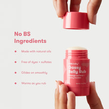 Gassy belly rub container in red, cap lifted by adult hands