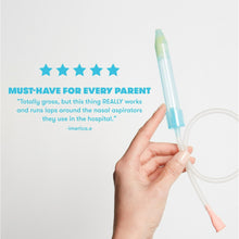 NoseFrida nasal aspirator with transparent tube and pink mouthpiece held upright