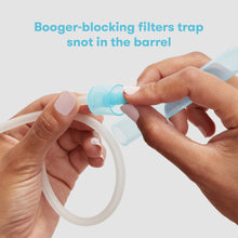 NoseFrida nasal aspirator with detachable blue filter tip shown held by hands