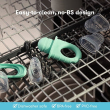 Frida baby push pop feeder parts in dishwasher rack, turquoise and clear domes