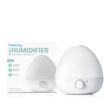 White round humidifier base with front dial, shown with product box packaging