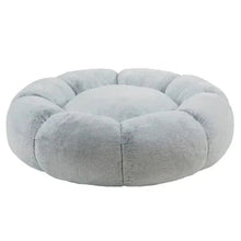 Light gray plush donut pet bed with deep center and padded outer ring