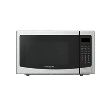 Frigidaire stainless steel countertop microwave oven with black glass door and keypad