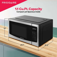 Compact microwave oven with right-side keypad, digital display, and black door window