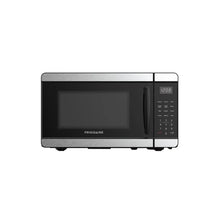 Black countertop microwave oven with LED display and keypad, front side angle