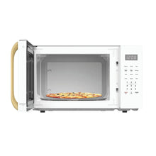 Countertop microwave with door open, showing interior cavity and turntable