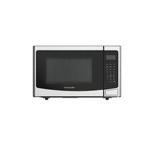 Countertop microwave oven front view with black door window and right control keypad