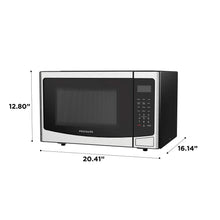 Countertop microwave oven with silver sides and black door window, right keypad and buttons