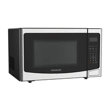 Countertop microwave with dark glass door and right-side keypad control panel