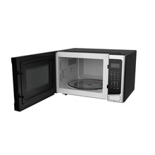 Countertop microwave oven with door open showing glass turntable and right control keypad