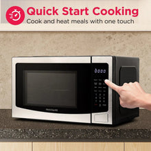 Frigidaire countertop microwave oven, stainless and black, right-side controls with finger