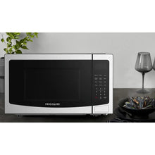 Frigidaire countertop microwave oven with right control panel, stainless and black