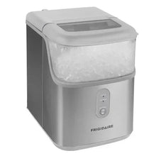 Stainless countertop nugget ice maker with lid open and ice-filled bin