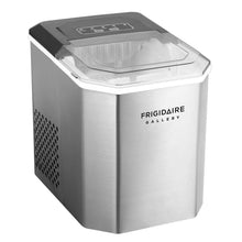 Stainless steel countertop ice maker with black top control panel and hinged lid
