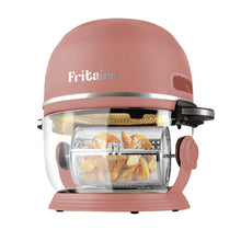 Fritaire pink air fryer with clear bowl and rotating mesh basket